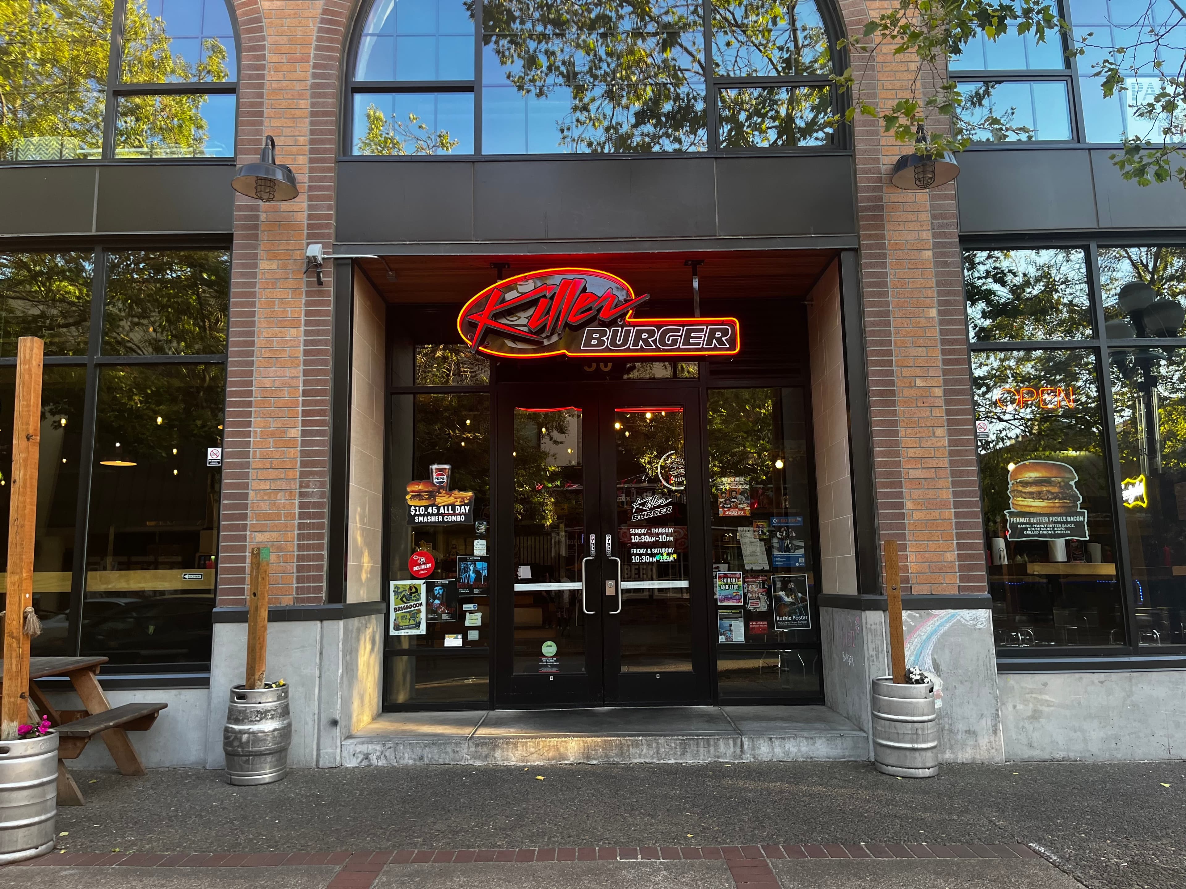 Killer Burger Downtown Eugene — brick storefront entrance with arched windows