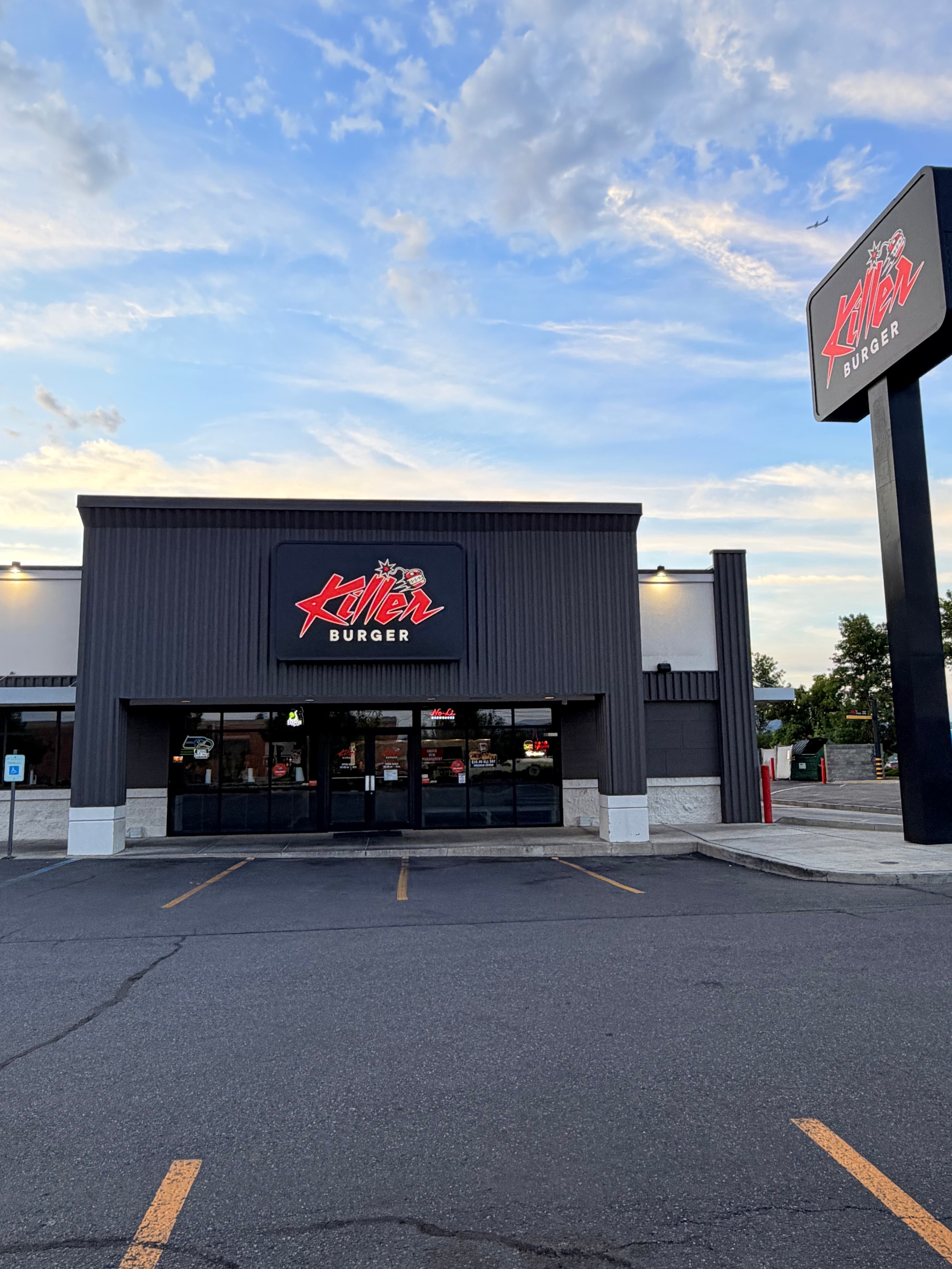 Killer Burger Spokane Valley — exterior storefront with pylon signage and blue sky
