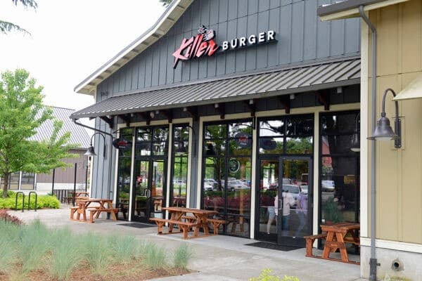Killer Burger Wilsonville — clapboard storefront exterior with patio seating and signage